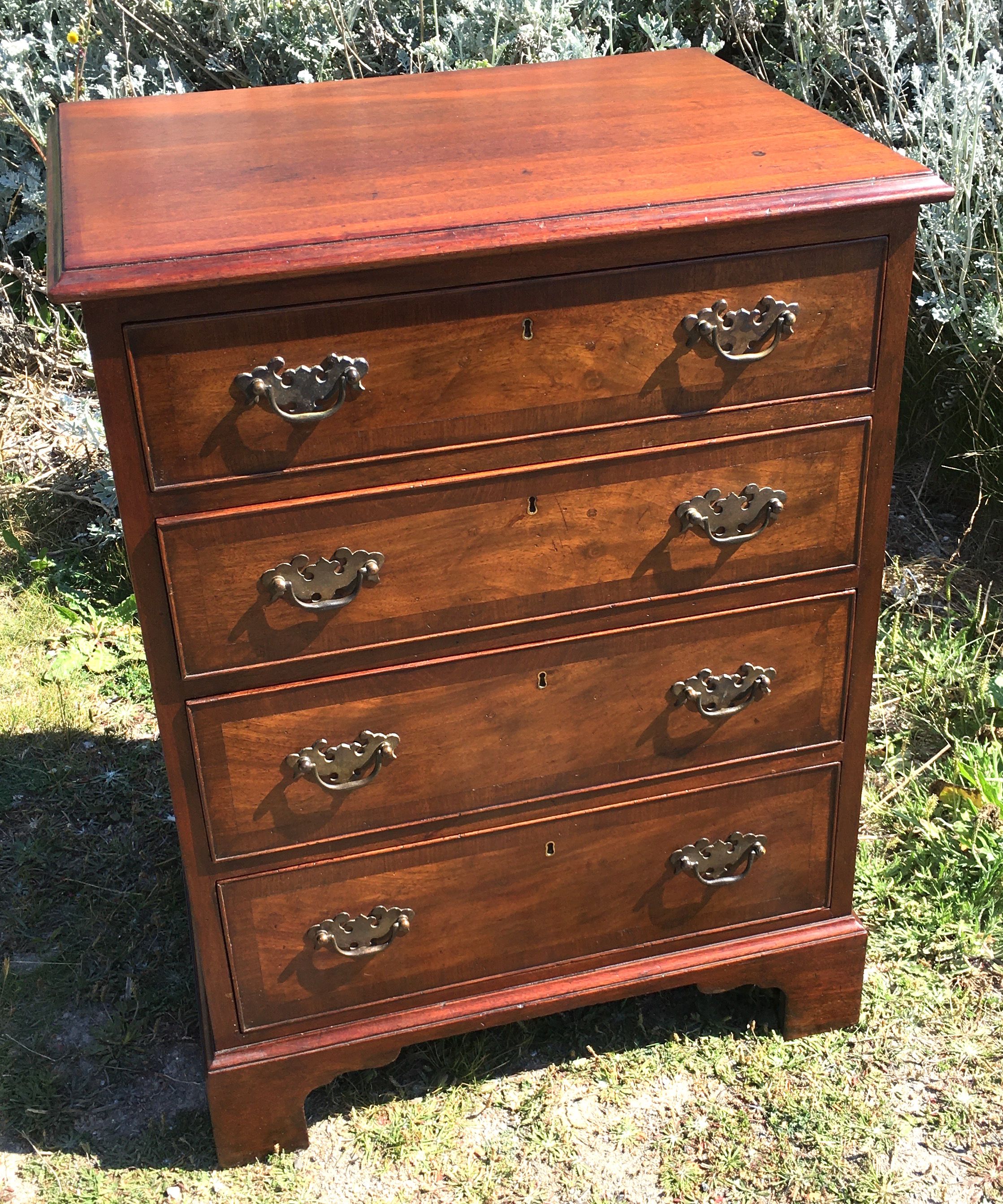 A small George III style mahogany chest, width 60cm, depth 46cm, height 78cm